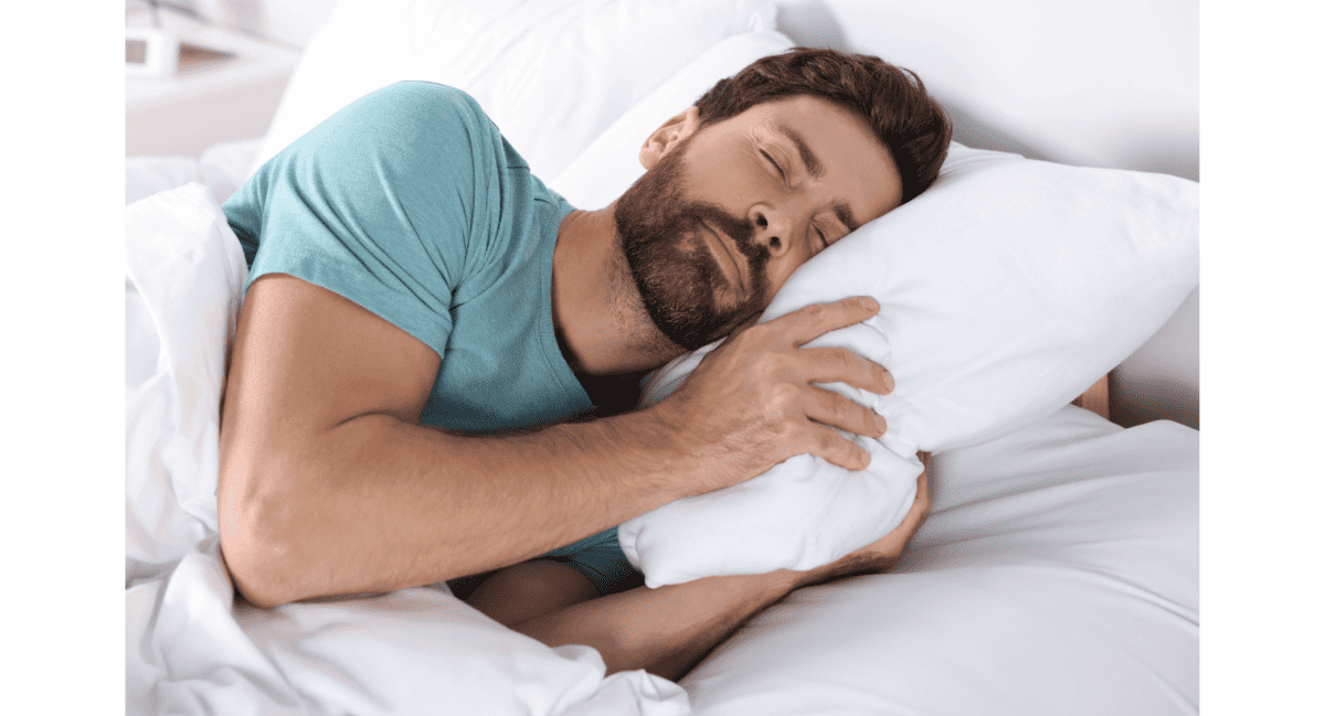 Man sleeping comfortably on a pillow
